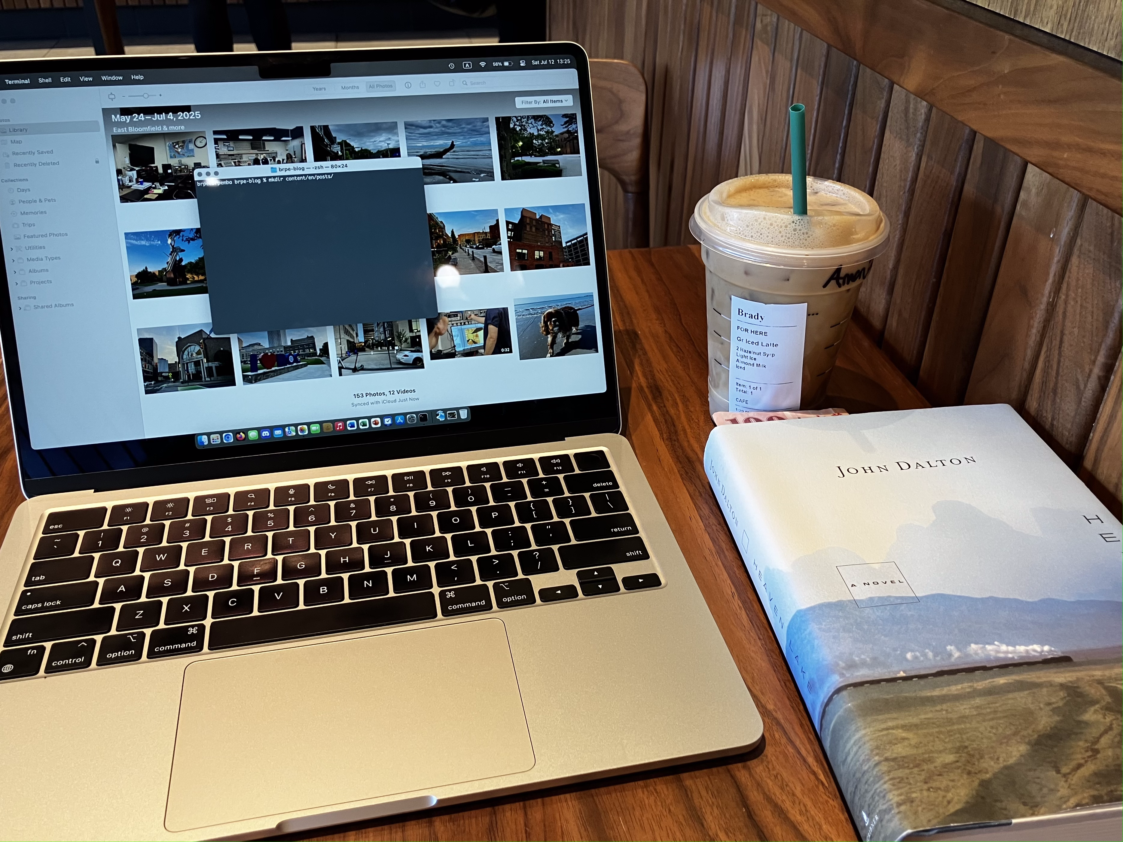 Laptop, coffee, and Heaven Lake by John Dalton.