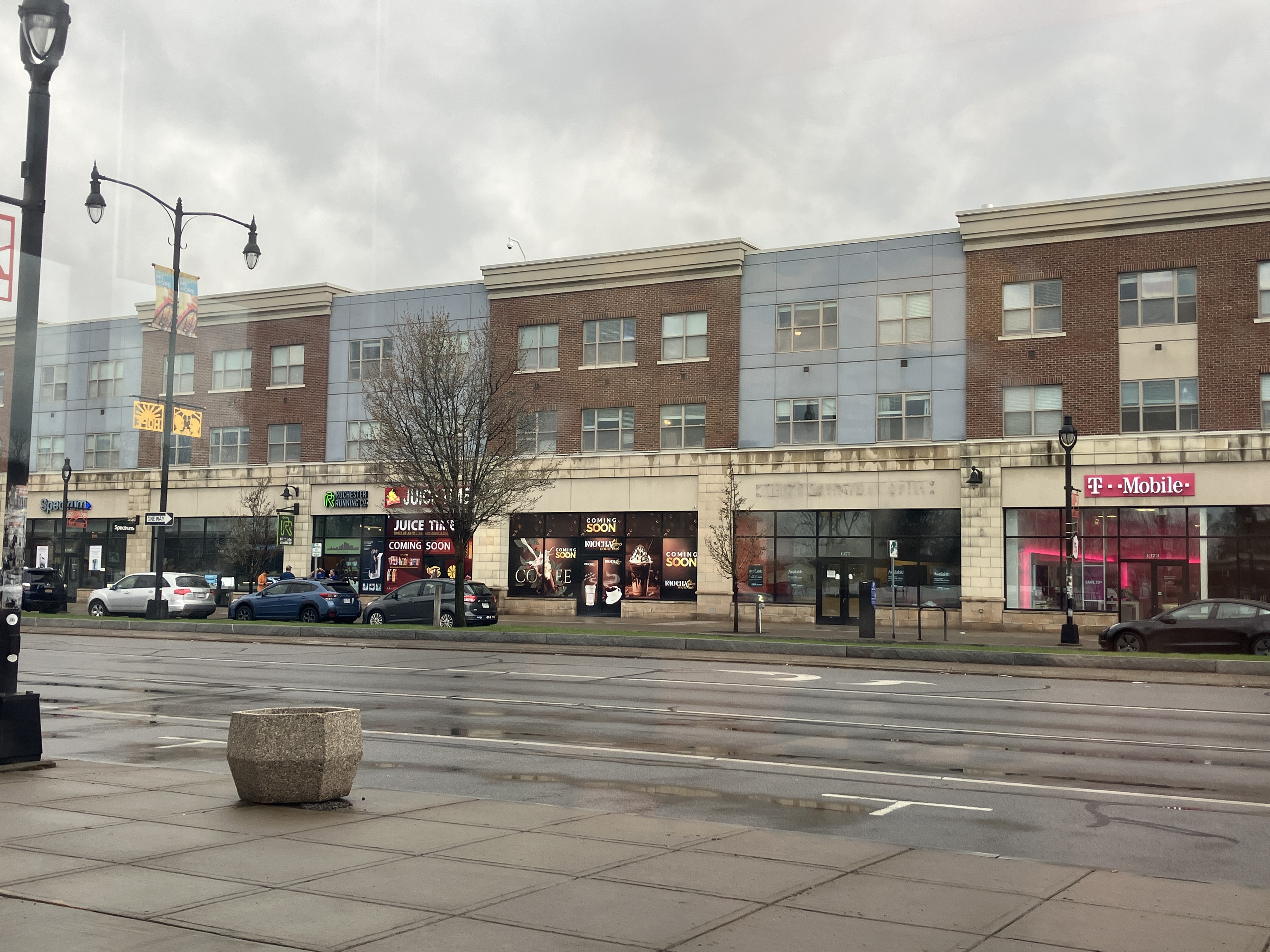 A rainy day and a city road.