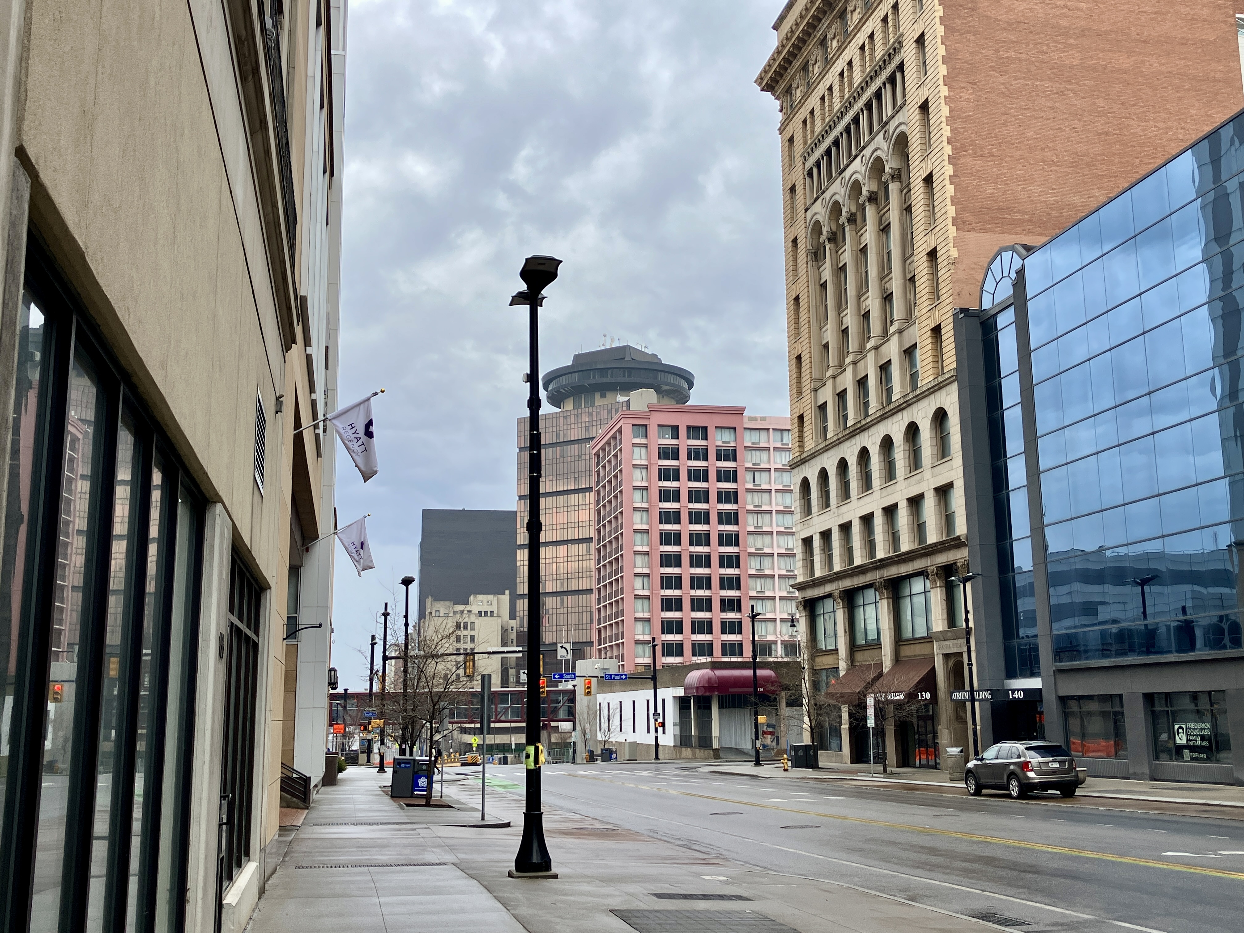A circular shape on top of a building, which is clearly a UFO.